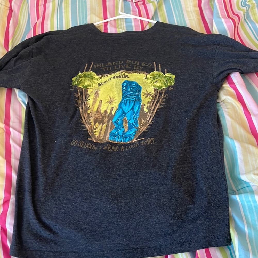 Grey plain shirt with tiki design on the back